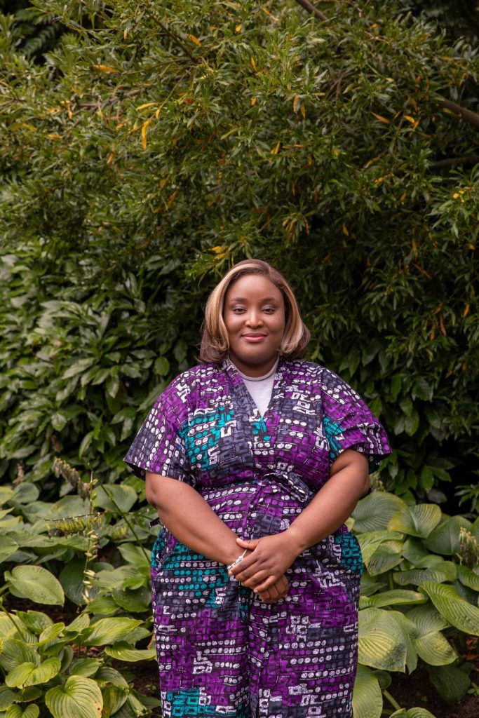 Kemi Fayomi from AfroConnectNZ posing for the camera